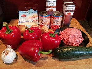 Gefüllte Paprika mit Tomaten-Zucchini-Sauce